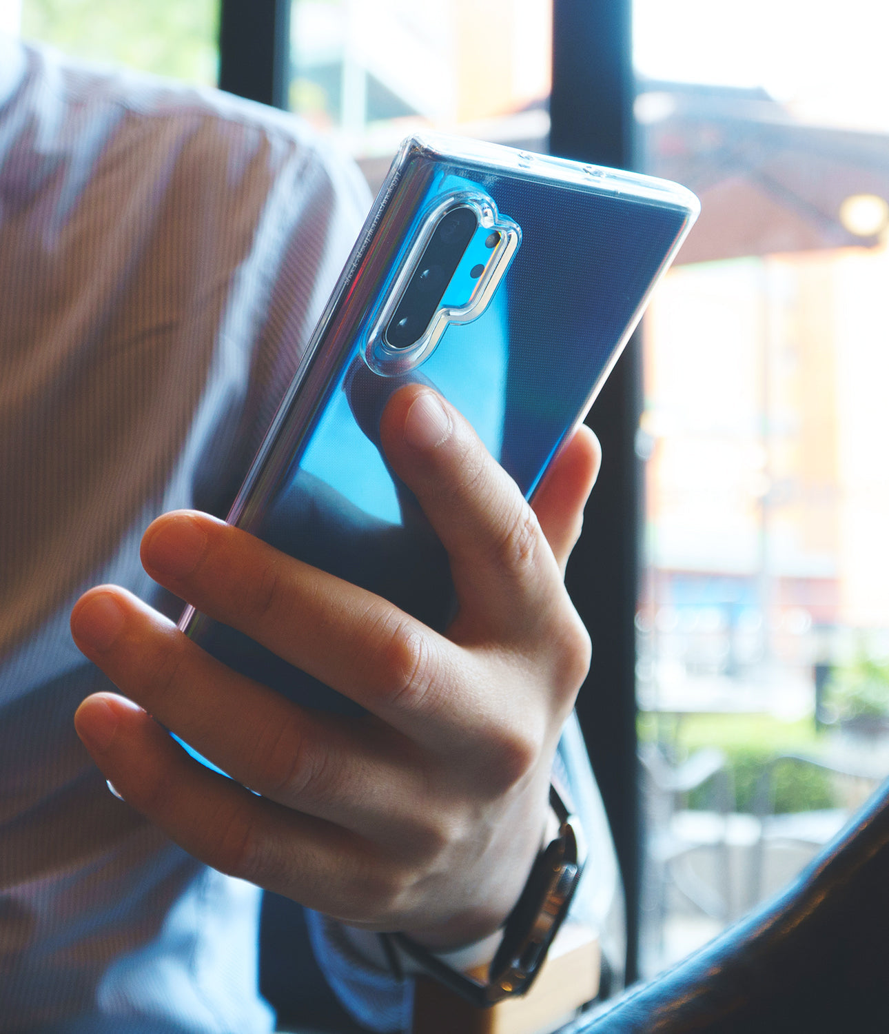 Galaxy Note 10 Plus Case | Air - Clear (Dot) - Hand holding a blue Galaxy Note 10 Plus in a clear, dotted protective case.