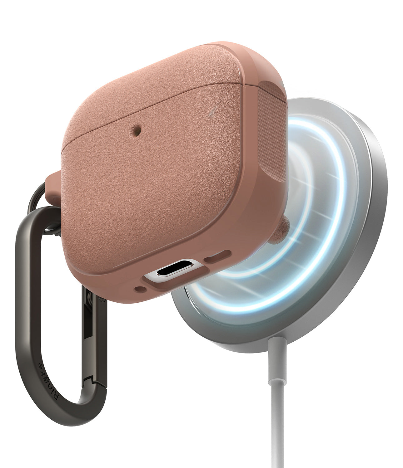 AirPods 4 Case | Onyx Magnetic - Textured rose-gold AirPods 4 case magnetically attached to a wireless charger with a black carabiner.