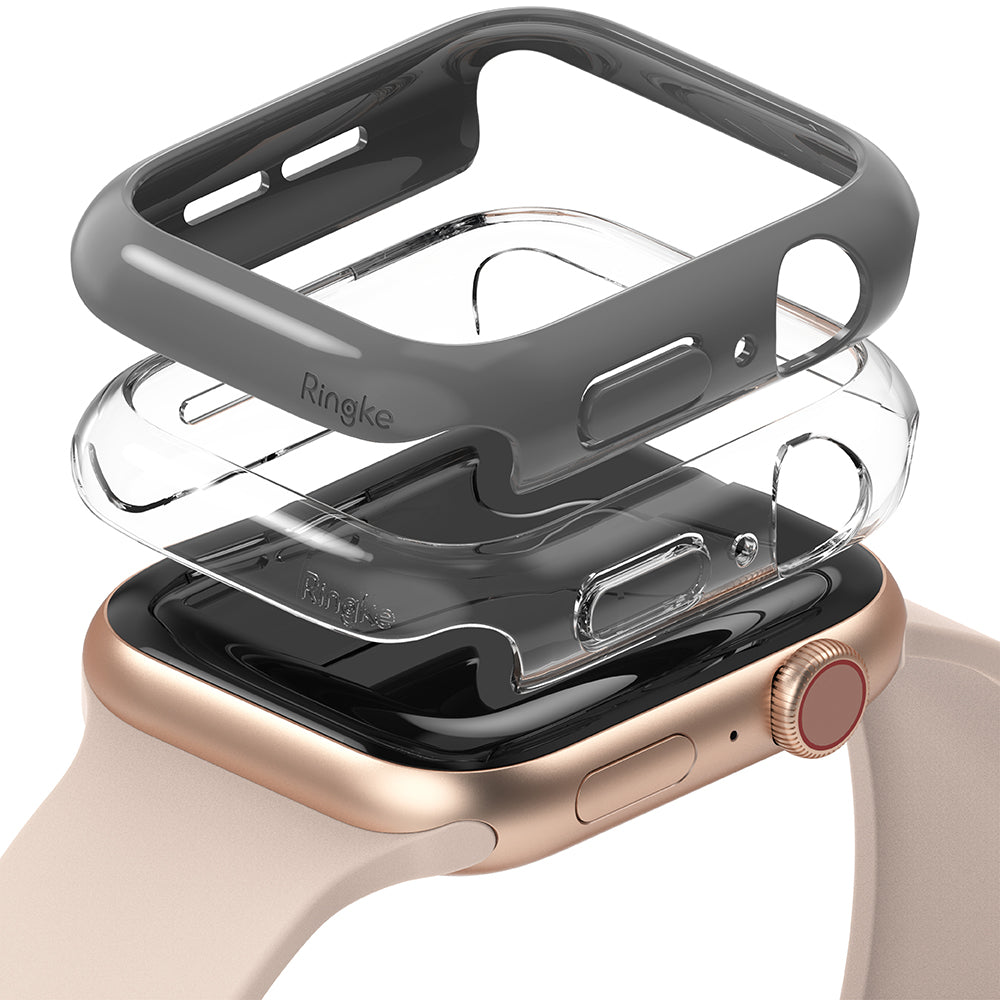 Apple Watch Series 6 / 5 / 4 / SE (44mm) Case | Slim (2 Pack) - Apple Watch Series 6 / 5 / 4 / SE (44mm) Case | Slim (2 Pack) - Two stacked protective cases, one gray and one clear, hovering above a gold Apple Watch.
