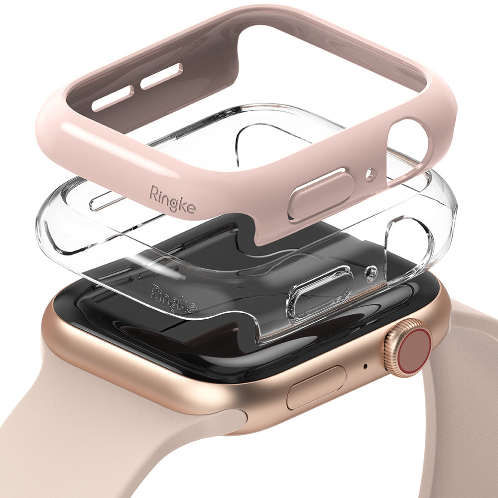 Apple Watch Series 6 / 5 / 4 / SE (44mm) Case | Slim (2 Pack) - Apple Watch Series 6 / 5 / 4 / SE (44mm) Case | Slim (2 Pack) - Pink and clear protective cases hovering over a gold watch.