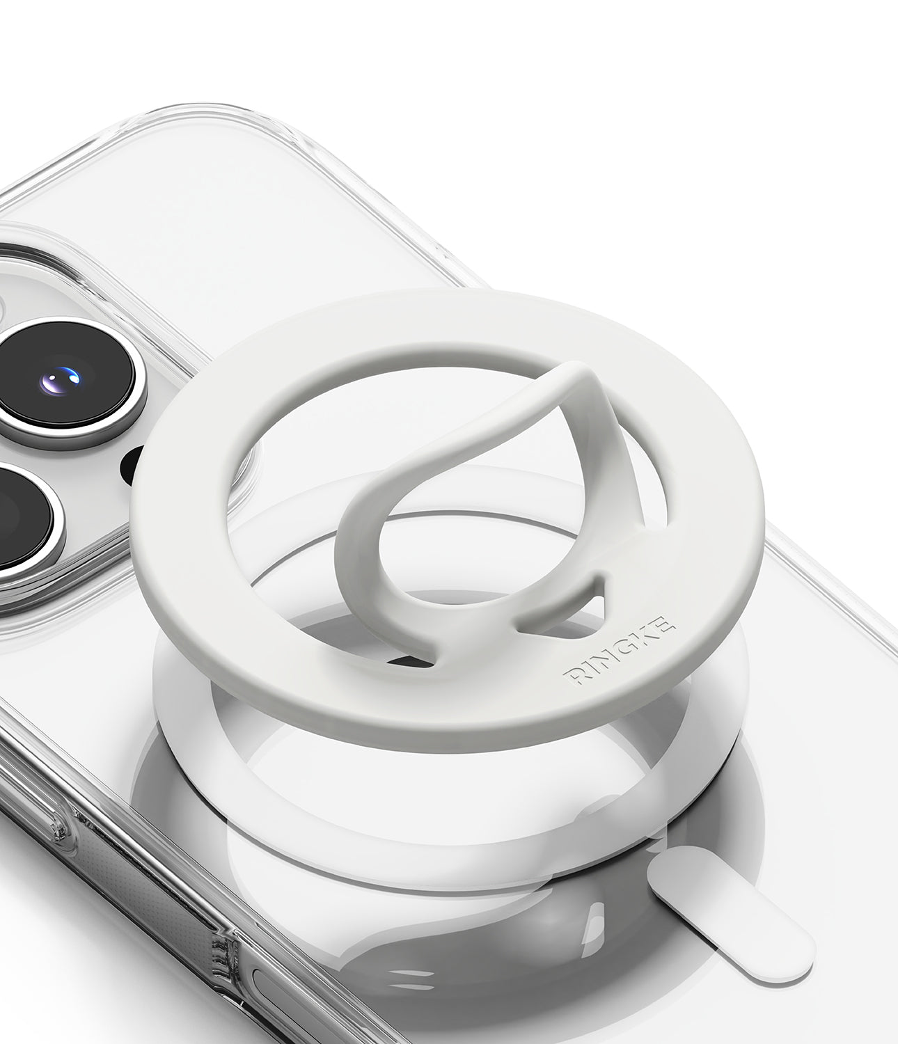 Dual Magnetic Silicone Ring - White silicone magnetic phone ring holder with a pull-out loop attached to a clear phone case.
