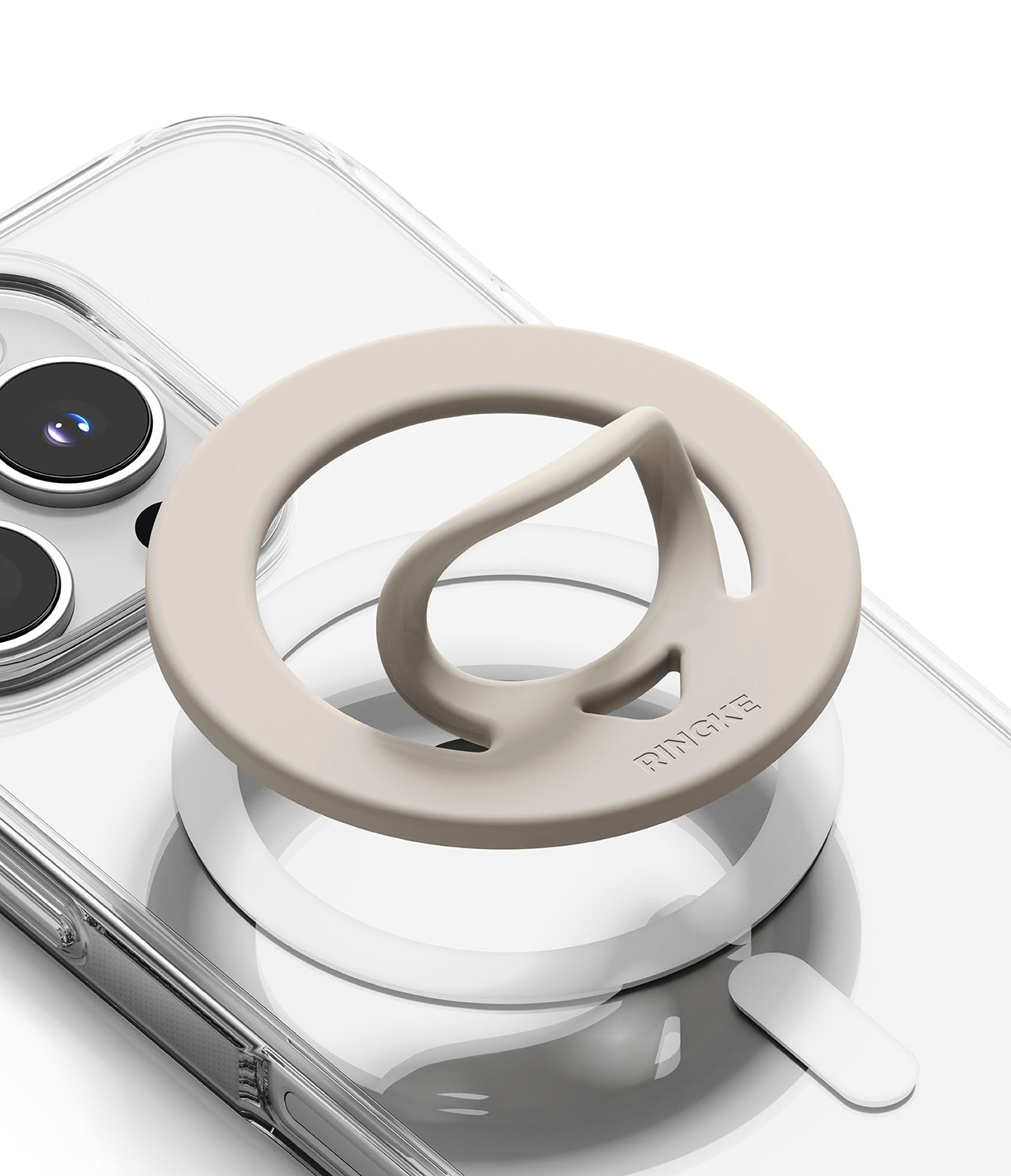 Dual Magnetic Silicone Ring - Beige silicone ring with a pop-out finger loop attached to a clear phone case.