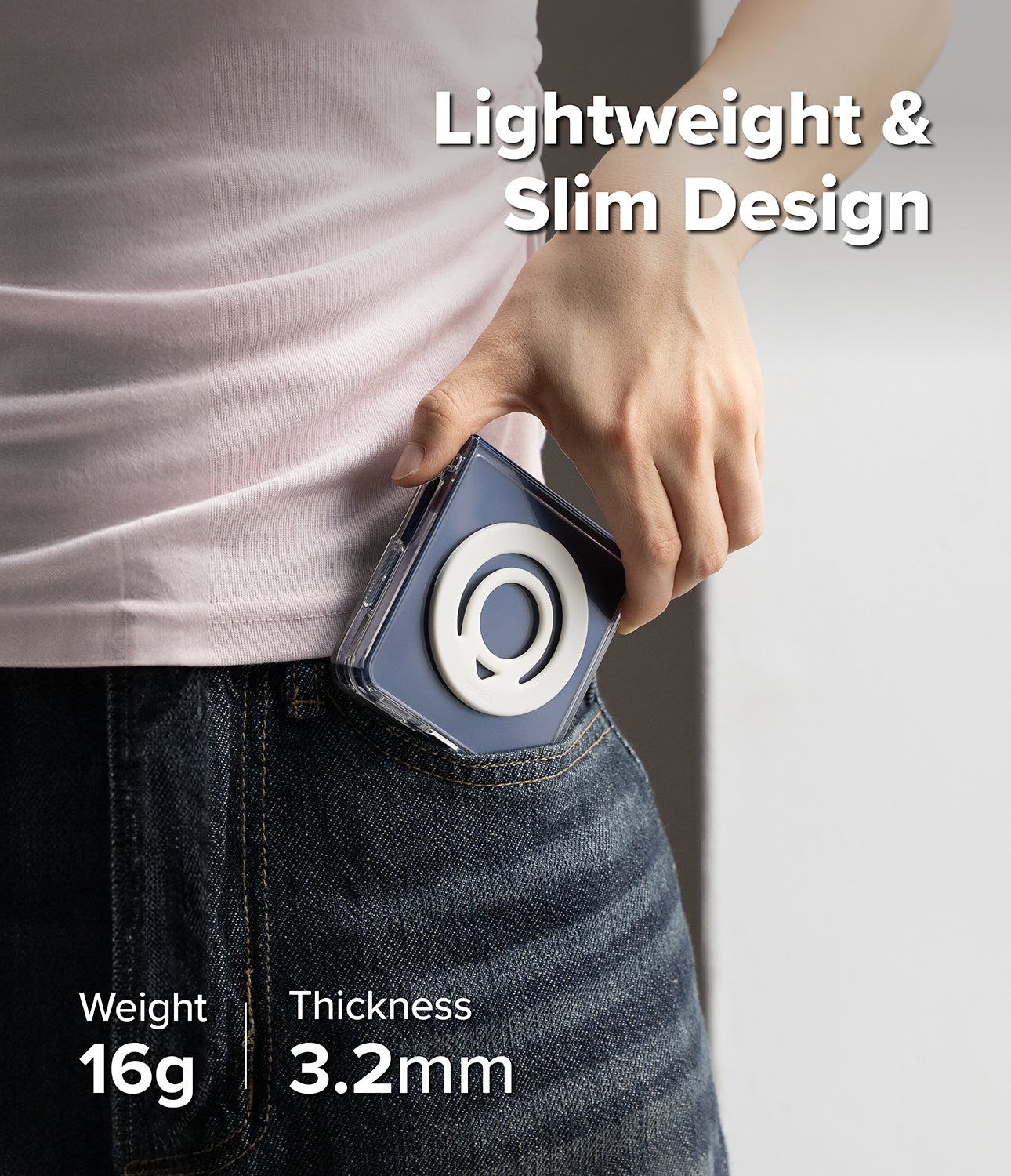 Dual Magnetic Silicone Ring - A white magnetic ring on a blue phone case being tucked into a pocket, highlighting slim design.