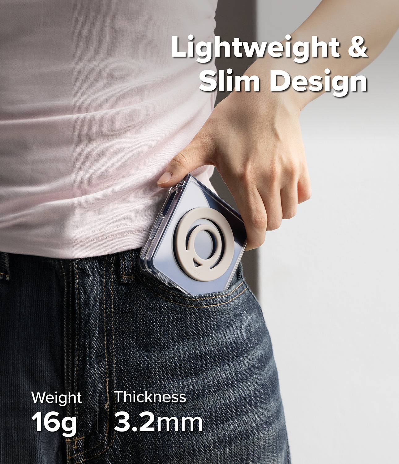 Dual Magnetic Silicone Ring - A slim phone case with a beige magnetic ring being tucked into a blue jean pocket.