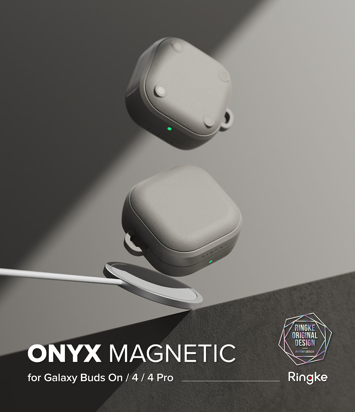 Samsung Galaxy Buds On / 4 Pro / 4 Case | Onyx Magnetic - Two gray textured earbud cases floating above a magnetic charging puck.