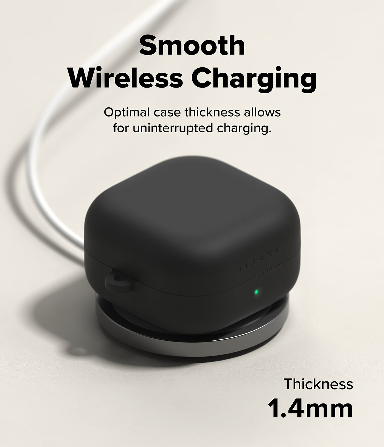 Galaxy Buds 4 Pro / 4 Case | Silicone - Black silicone case on a wireless charger with a green LED charging indicator.