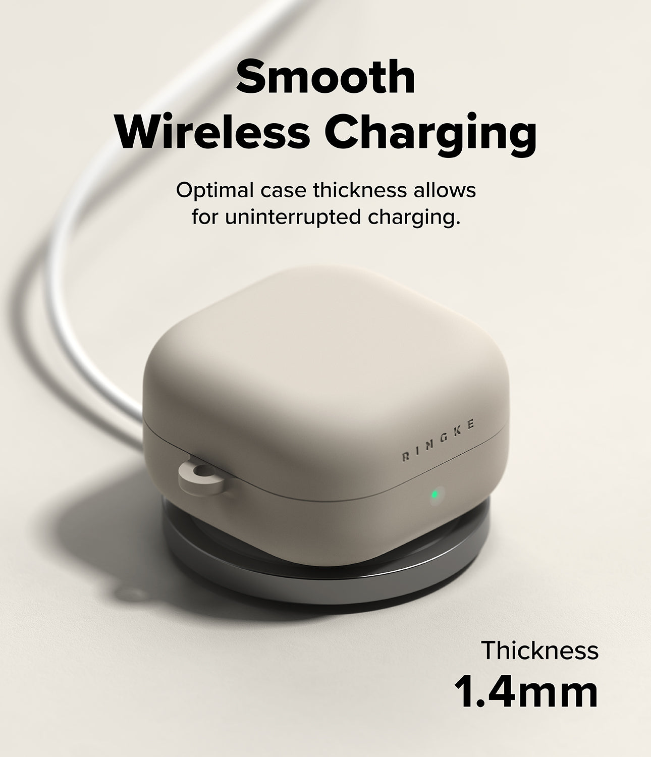 Galaxy Buds 4 Pro / 4 Case | Silicone - Beige earbud case on a wireless charger with 1.4mm thickness text.