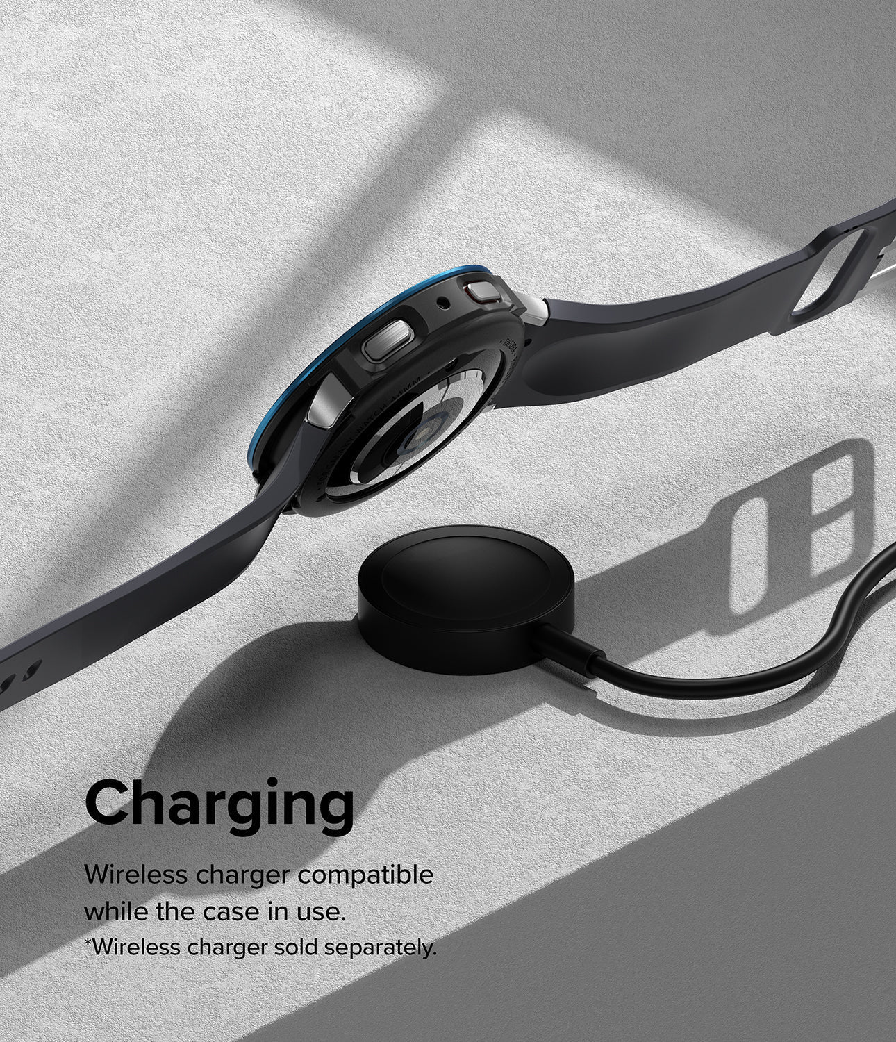Galaxy Watch 5 44mm | Air Sports Black + Bezel Styling - Smartwatch with protective case charging on a wireless dock.