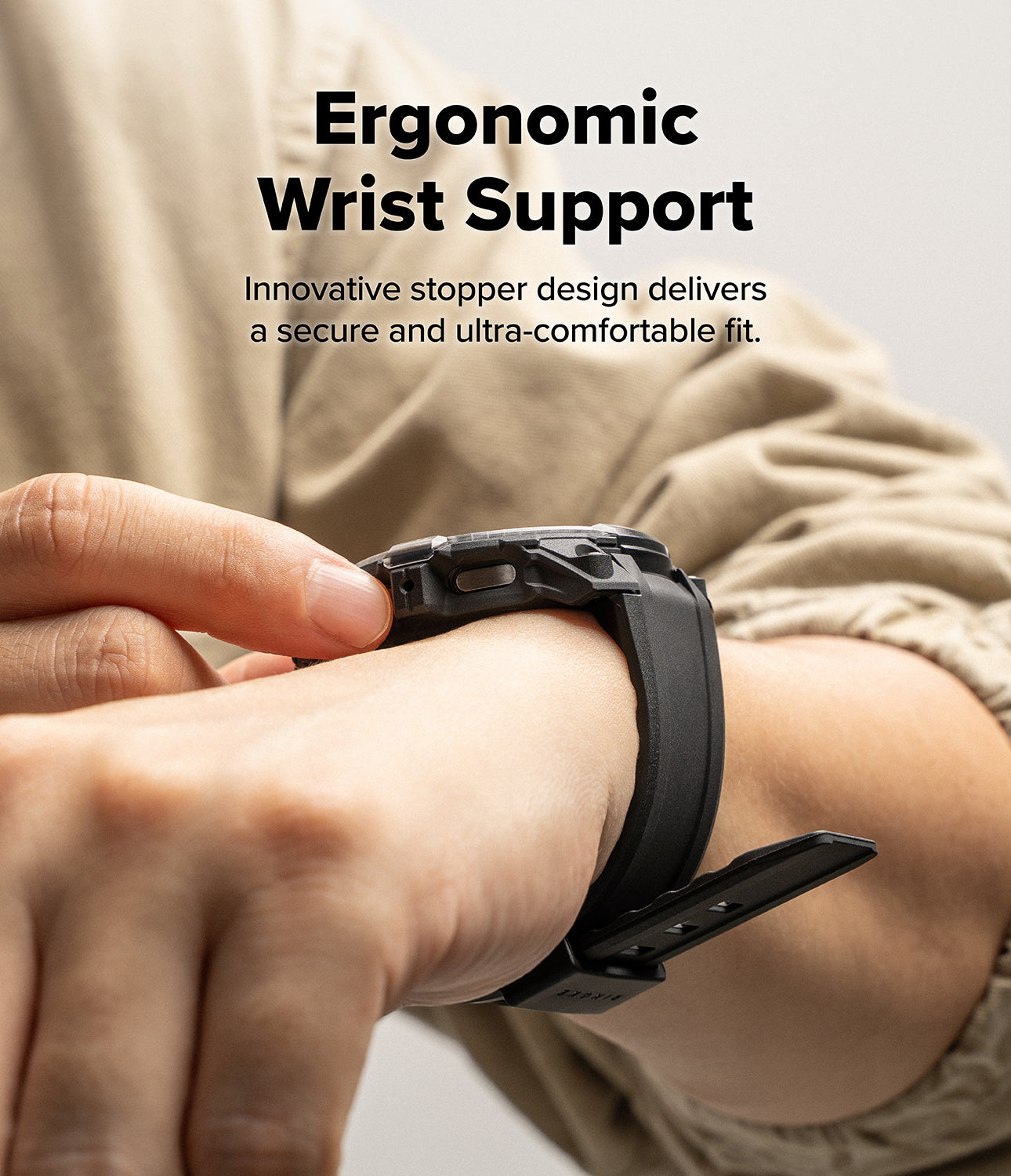 Galaxy Watch 8 44mm Case + Band | Rugged Gear - Person wearing a black smartwatch with ergonomic wrist support design.