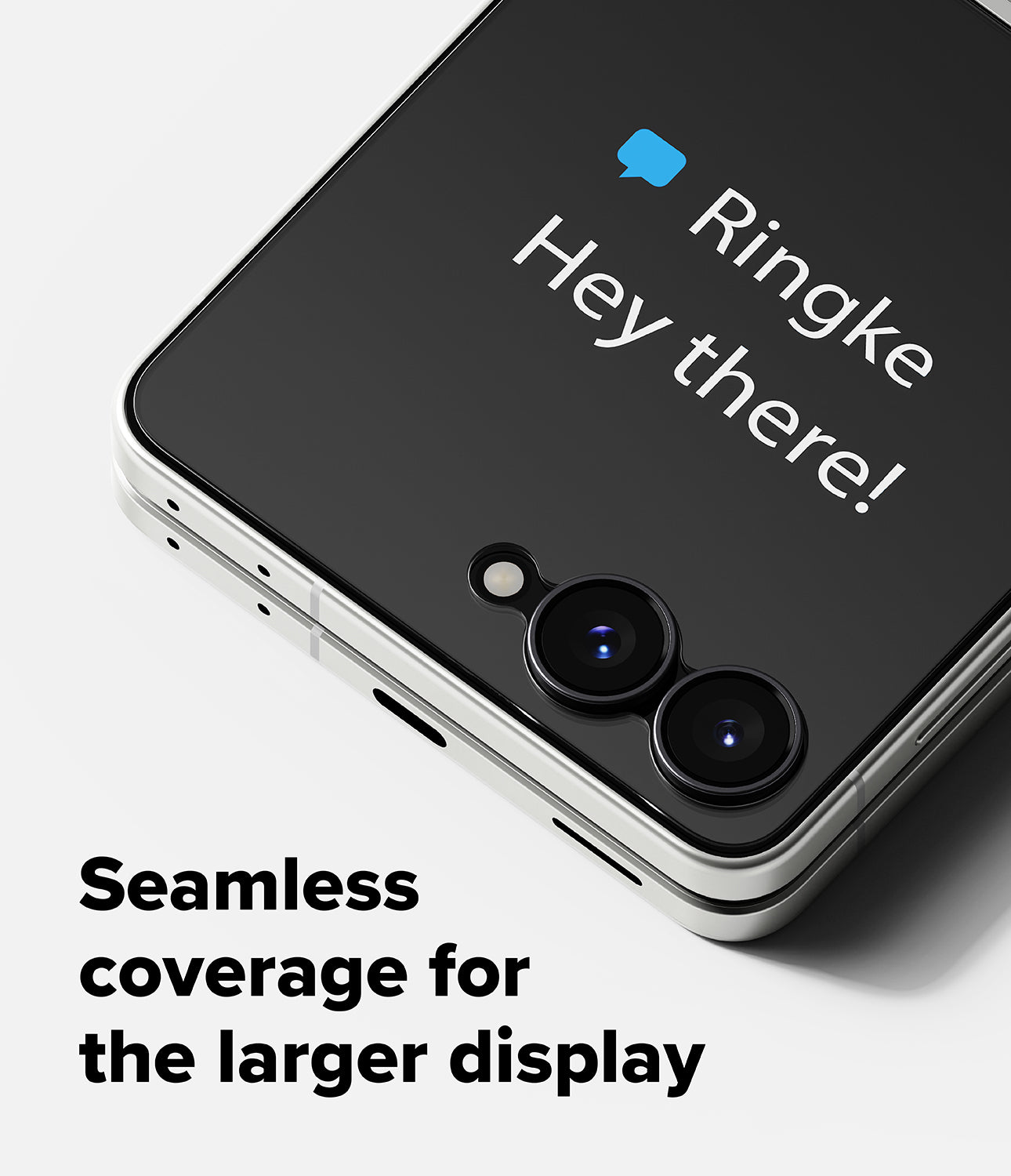 Galaxy Z Flip 8 Screen Protector | Cover Display Tempered Glass Pro (2 Pack) - Close-up of a smartphone showing a black protective screen overlay with the text 'Ringke Hey there!' and a blue speech bubble icon, plus the marketing text 'Seamless coverage for the larger display' on a light gray background.
