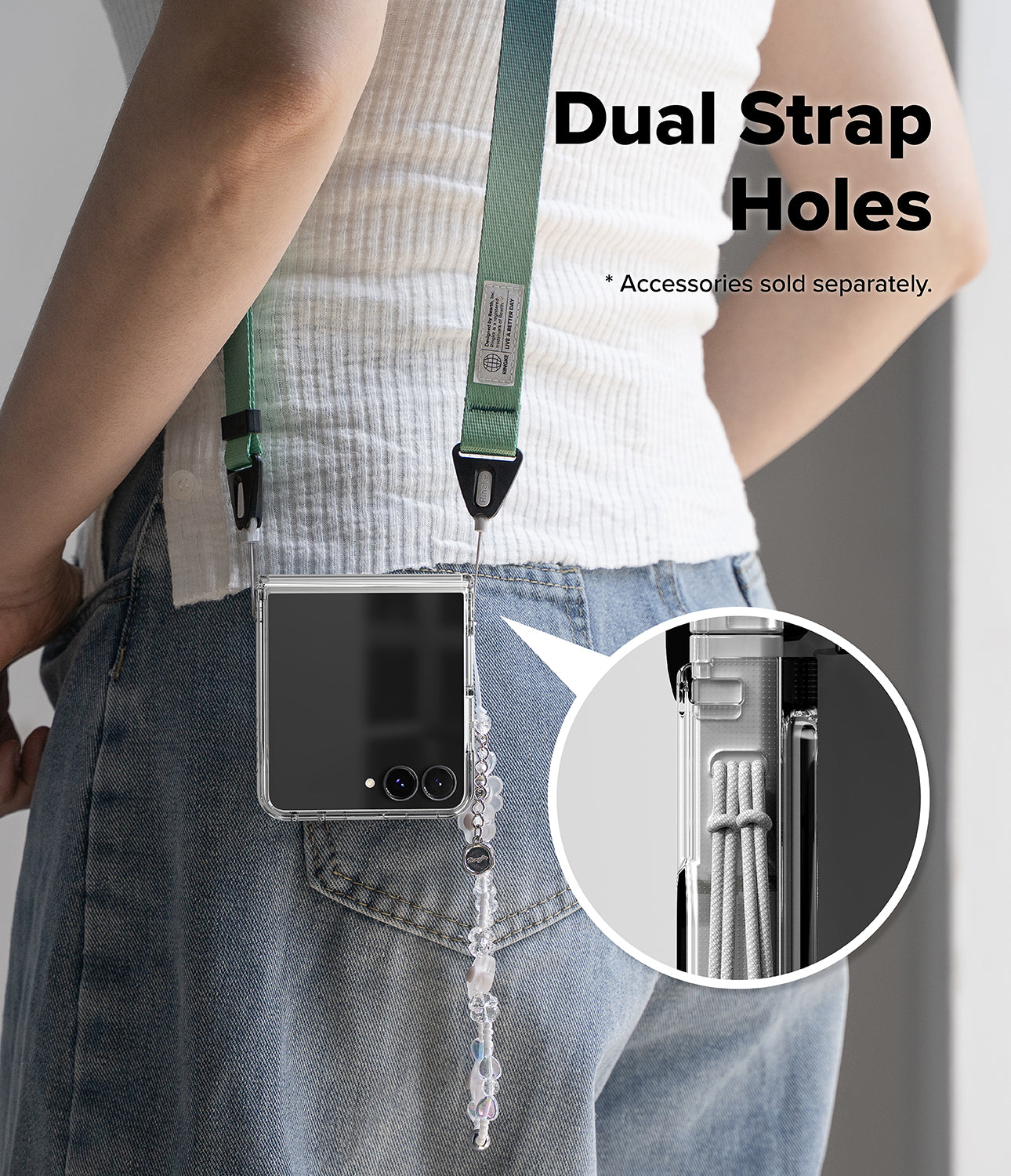 Galaxy Z Flip 8 Case | Fusion Flap - A person wearing a clear phone case with a green adjustable strap and dangling charm, shown from the back over blue jeans. Large text reads 'Dual Strap Holes' with a note that accessories are sold separately, and a circular inset shows the strap attachment detail.