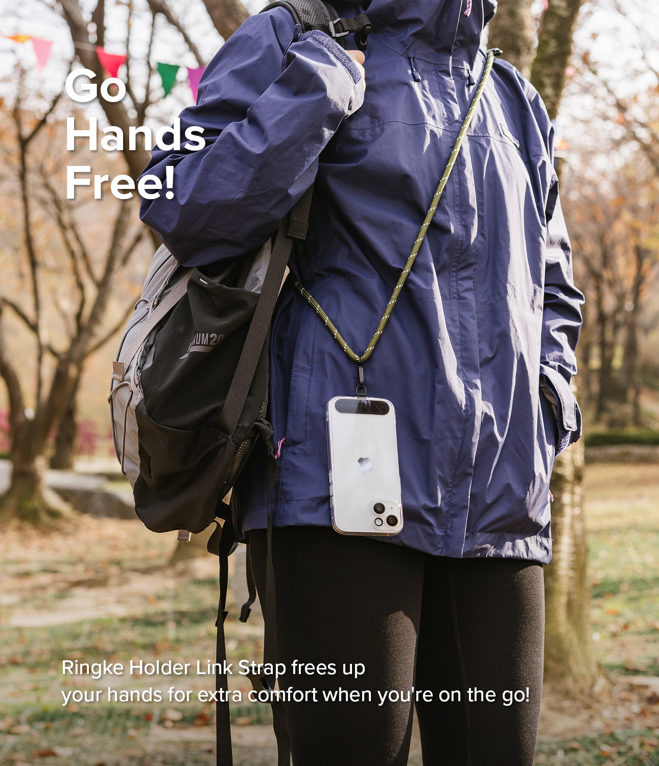 Holder Link Strap | Black - Person wearing a khaki rope phone strap across their body with a smartphone hanging at their hip.