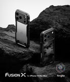 Two iPhone 17 Pro Max cases on a rocky surface with 'Fusion X' branding.