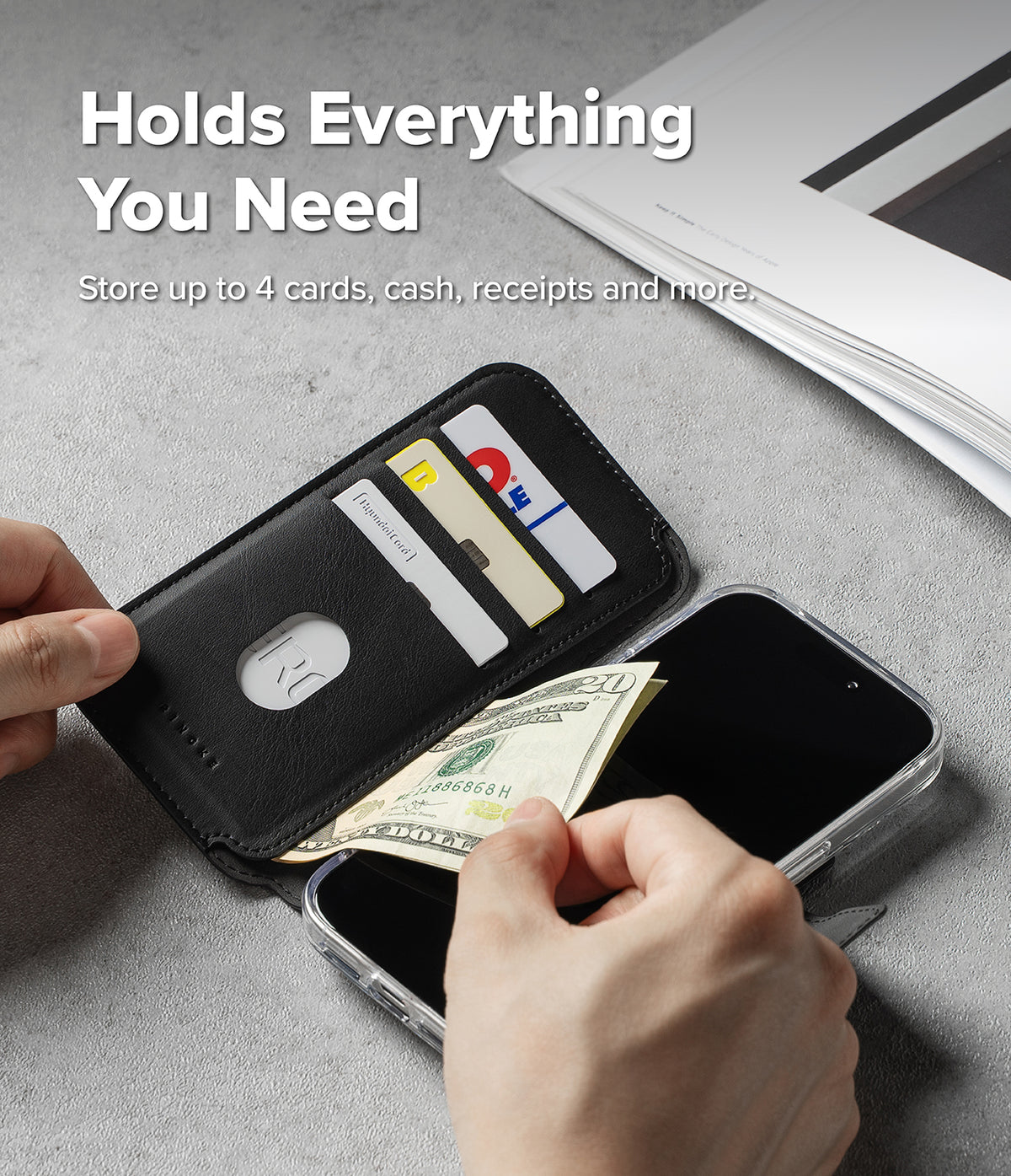 iPhone 18 Pro MagSafe Wallet | Folio Grip Wallet Magnetic - A black leather wallet phone case shown open with hands inserting cash and holding cards, placed over a smartphone on a gray surface. White text at the top reads 'Holds Everything You Need' and 'Store up to 4 cards, cash, receipts and more.