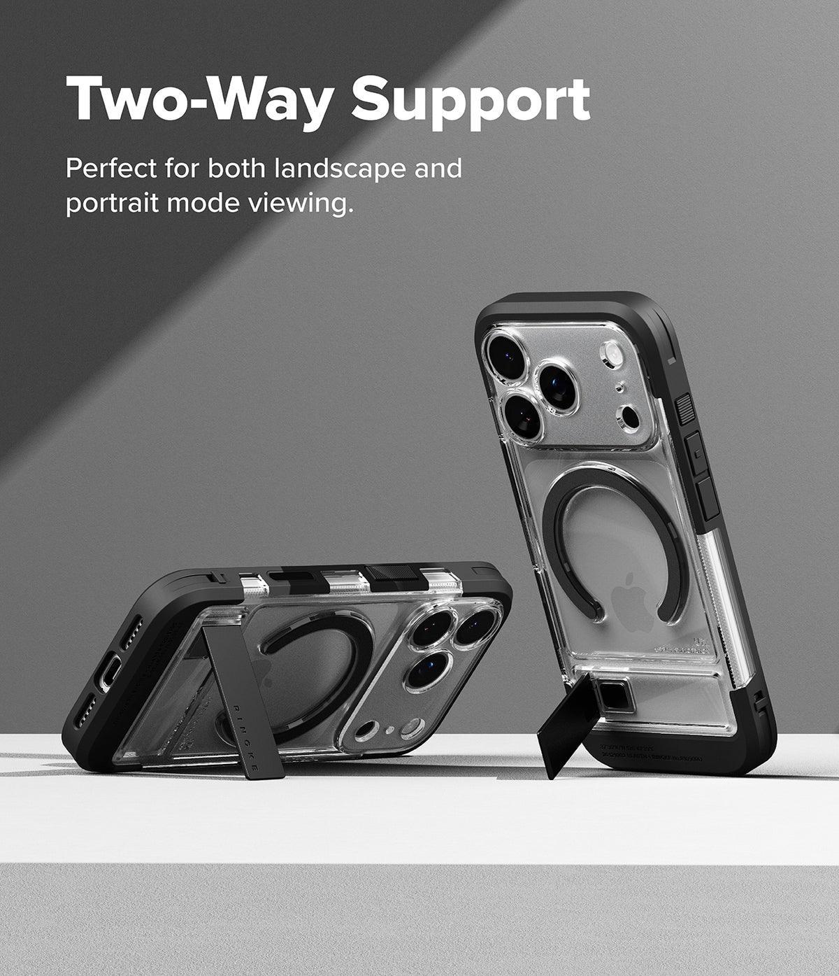 iPhone 18 Pro Case | UX Magnetic - Transparent phone case with black bumper edges and a built-in kickstand, shown standing upright and propped horizontally on a light surface against a gray background. White text at the top reads 'Two-Way Support' with smaller supporting copy.