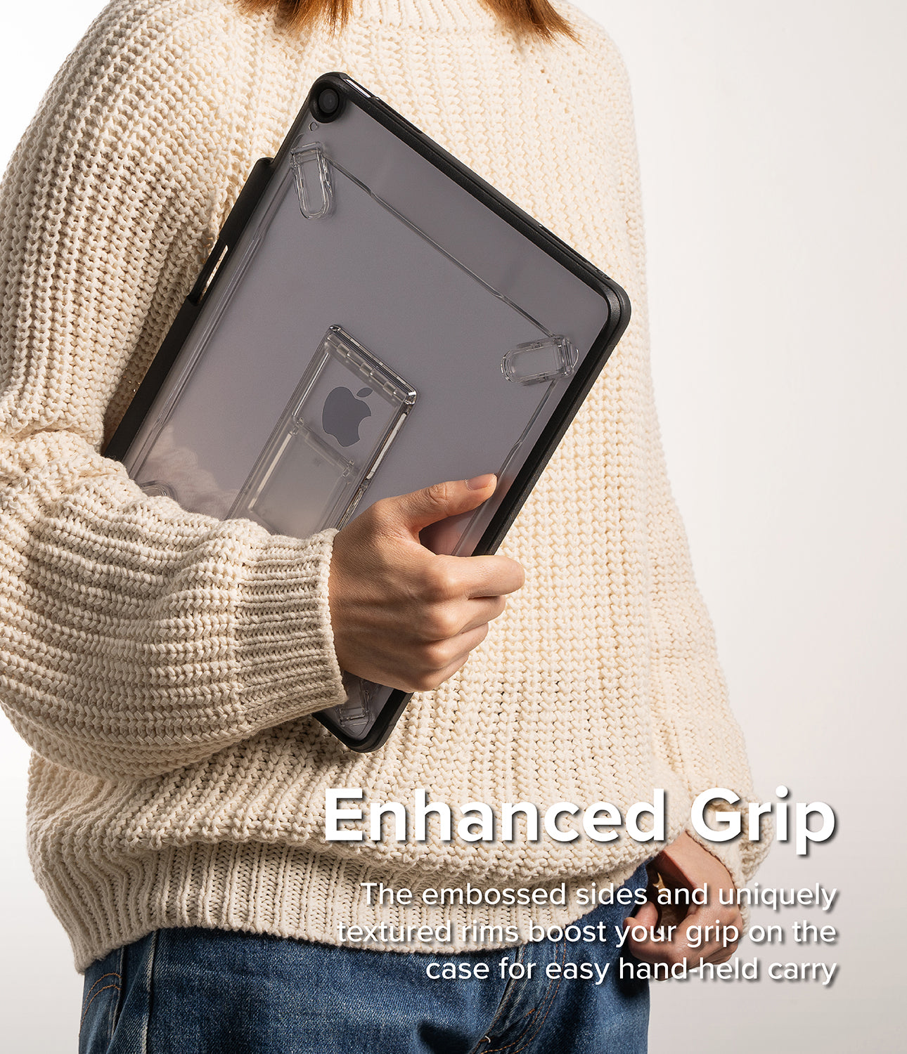 Fusion Sketch Stand | iPad - Person in a cream sweater holding a clear, protective iPad case with a built-in kickstand.
