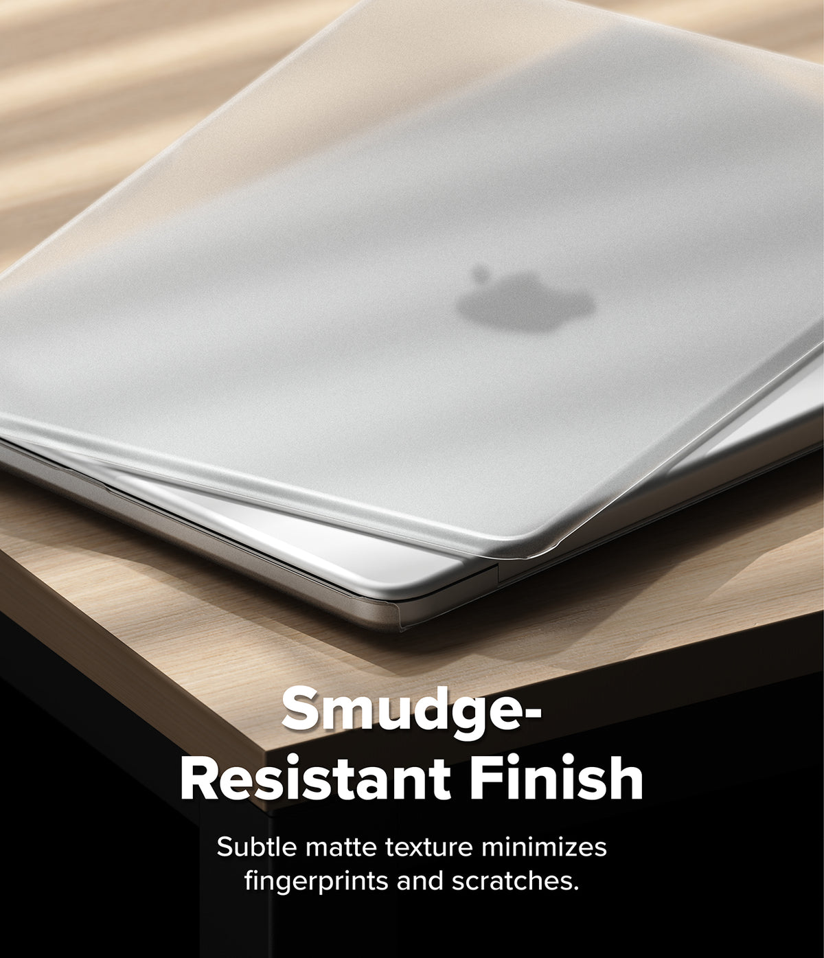 MacBook Neo Case + Protector all-groups - A close-up of a silver laptop with a clear smudge-resistant protective skin on the lid, resting on a light wood surface. White text at the bottom reads 'Smudge-Resistant Finish' with a subtitle about minimizing fingerprints and scratches.