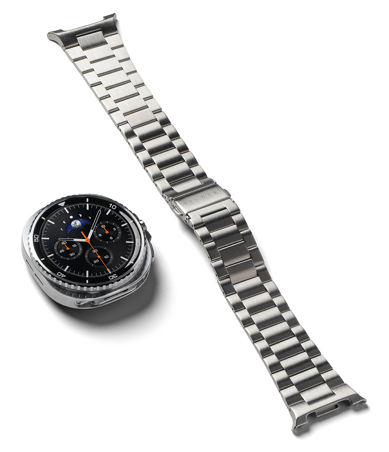 Galaxy Watch 9 / 8 | Metal One Air - A silver stainless steel link watch band displayed next to a smartwatch with a black analog-style digital face on a clean white background.