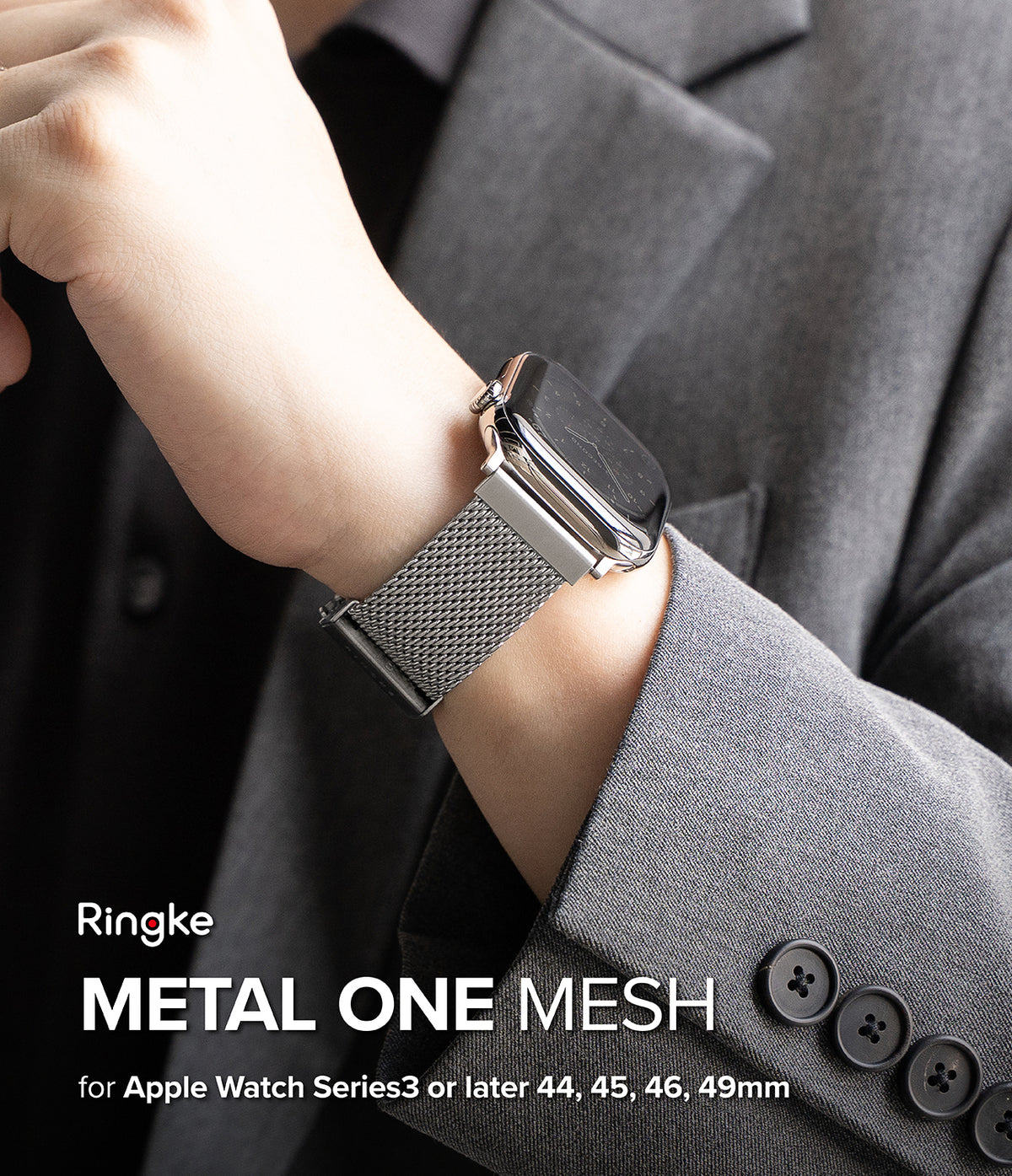 Apple Watch 49·46·45·44 mm | Metal One Mesh - A close-up of a person wearing a gray suit jacket and adjusting a smartwatch with a silver mesh band. The text overlay reads 'Ringke METAL ONE MESH for Apple Watch Series3 or later 44, 45, 46, 49mm'.