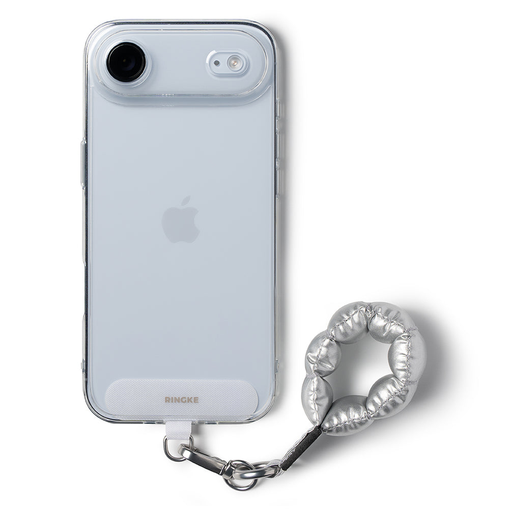 Holder Link Puffer | Finger - Light blue iPhone in a clear case with a silver puffer-style finger strap attached.