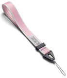 Pink and gray strap with a carabiner on a white background