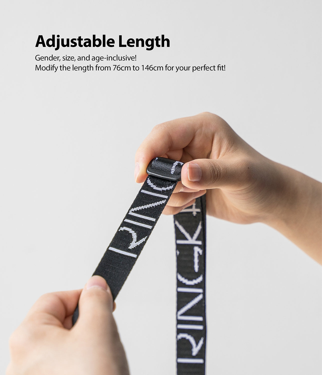 Shoulder Strap | Lettering - Hands adjusting a black strap with white Ringke lettering and a plastic slider buckle.