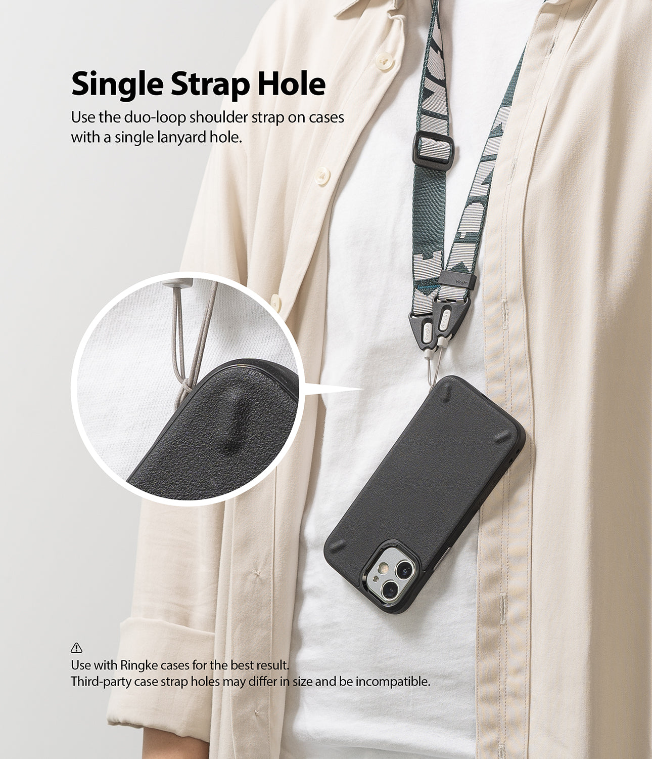 Shoulder Strap | Lettering - Person wearing a phone case with a patterned shoulder strap attached to a single lanyard hole.