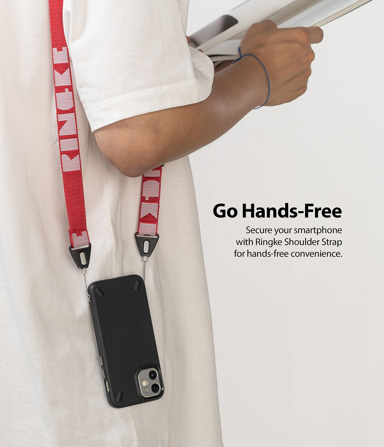 Shoulder Strap | Lettering - Person wearing a red Ringke branded shoulder strap attached to a black smartphone case.