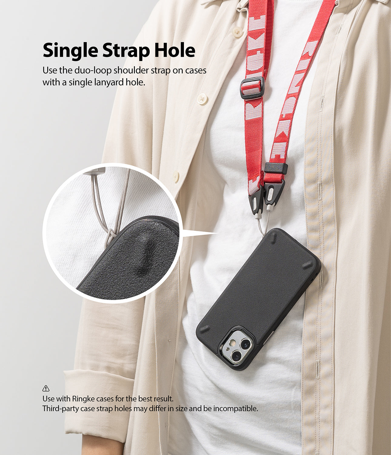 Shoulder Strap | Lettering - Person wearing a red branded shoulder strap attached to a black phone case via a single loop.