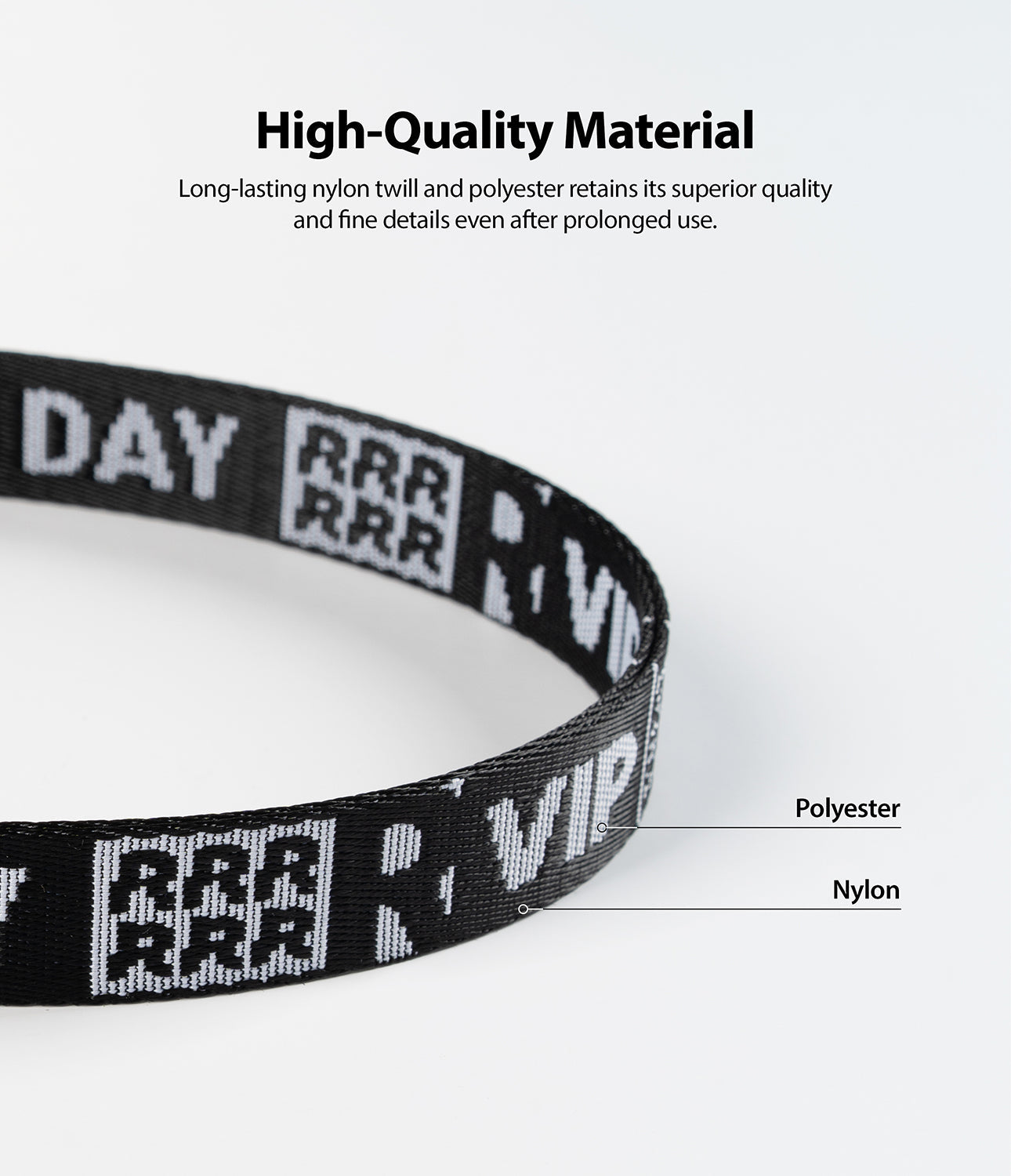 Shoulder Strap | Lettering - Close-up of a black nylon and polyester strap featuring white pixelated text and logos.