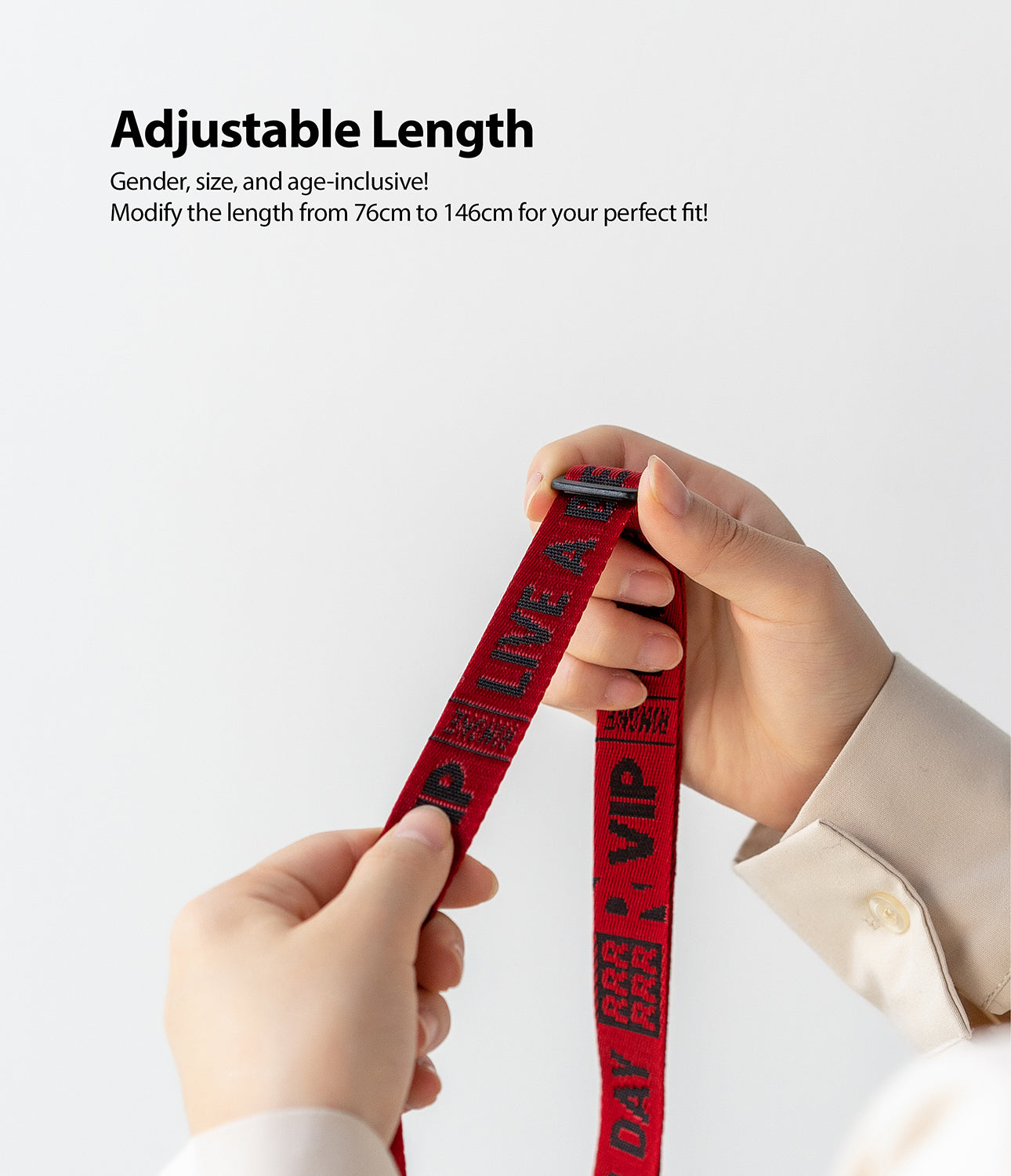 Shoulder Strap | Lettering - Hands adjusting a red shoulder strap with black lettering and a sliding buckle.