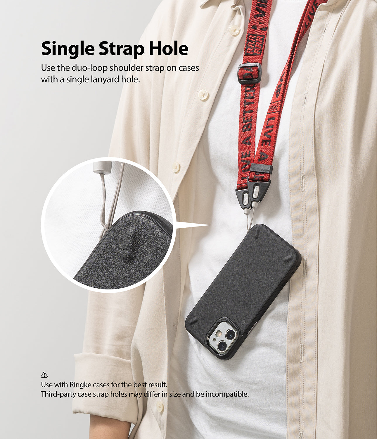 Shoulder Strap | Lettering - Person wearing a red branded shoulder strap attached to a black phone case via a single loop.