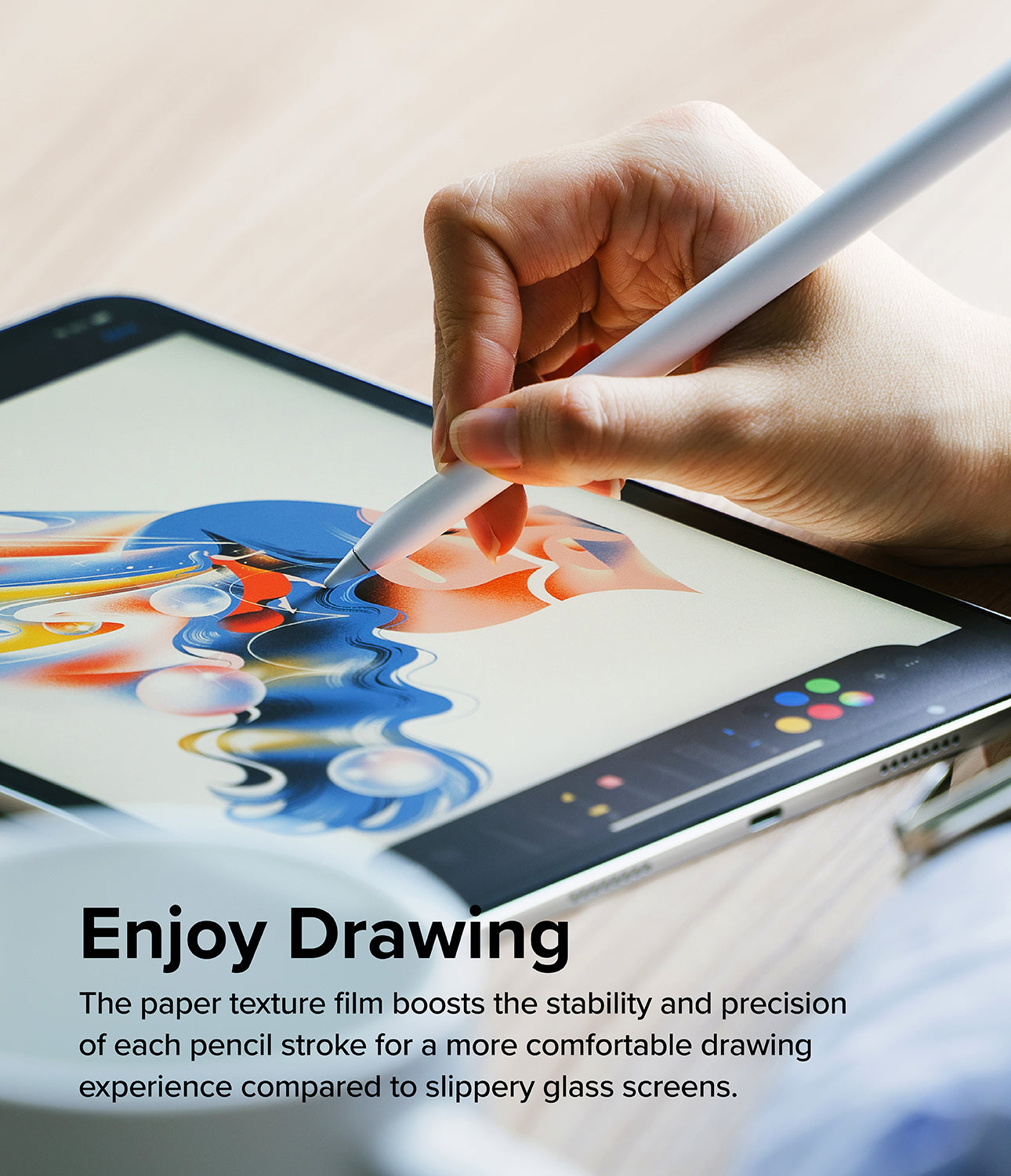Paper Touch Film Hard | iPad - Paper Touch Film Hard - Hand using a stylus to draw on an iPad screen with a textured paper-feel screen protector.