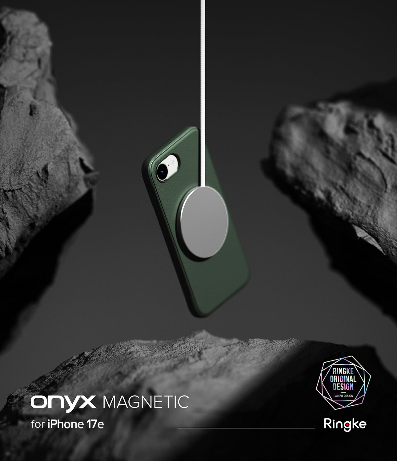 iPhone 17e Case | Onyx Magnetic - Dark green phone case suspended by a magnetic charger between textured grey rocks.