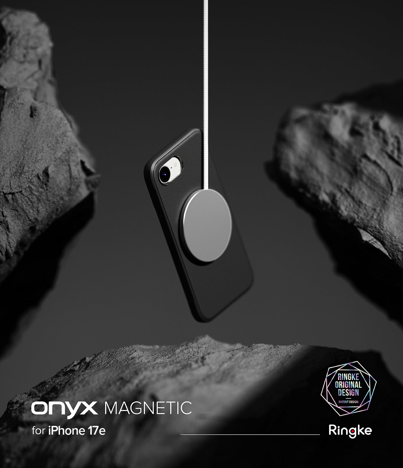 iPhone 17e Case | Onyx Magnetic - Black phone case suspended by a magnetic charger between dark, jagged rocks.