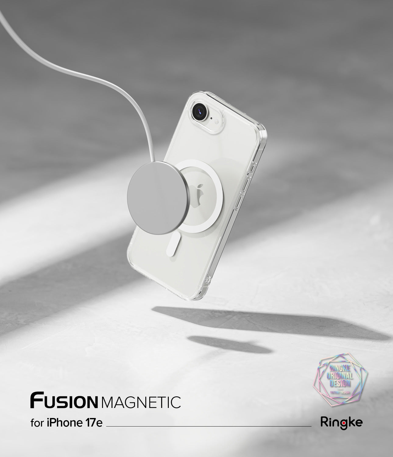 iPhone 17e Case | Fusion Magnetic - Clear phone case with a magnetic charger attached, floating against a grey background.