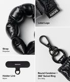 Holder Link Puffer | Finger - Black finger strap with round carabiner and 360° swivel ring, featuring Ringke branding.