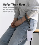 Holder Link Puffer | Hand - Person wearing a black lanyard with a phone holder, sitting on a chair.
