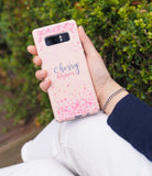 Galaxy Note 8 [Slim Cherry Blossom] [Limited Edition] - Hand holding a pink phone case with cherry blossom petal art.