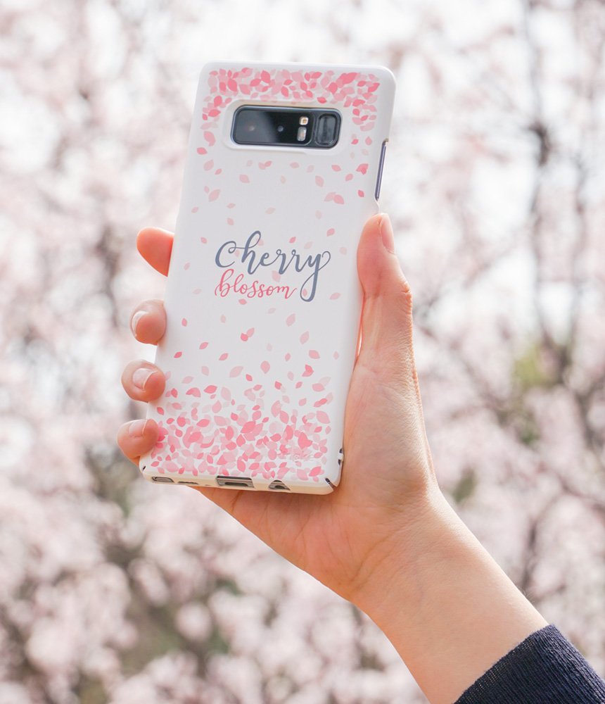 Galaxy Note 8 [Slim Cherry Blossom] [Limited Edition] - Hand holding white phone case with pink petals and script text.