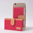 Ringke® Leather ID / Card Holder, 3M Adhesive Stick On Mini Wallet Attachment for All Phone Devices - Ringke® Leather ID / Card Holder - Two pink and tan leather adhesive card holders, one attached to a phone, one standing.