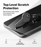 [Bundle] Galaxy A57 | Fusion-X - A metal key resting on a smartphone screen protector, demonstrating 9H hardness scratch resistance.