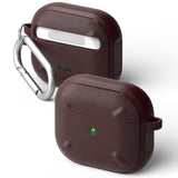 AirPods 3 Case | Onyx - Two dark maroon, textured protective cases for AirPods 3 with a silver carabiner and green LED light.
