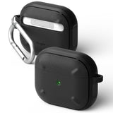 AirPods 3 Case | Onyx - Two black textured protective cases for AirPods 3, one with a silver carabiner and one showing a green LED.