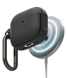 AirPods 4 Case | Onyx Magnetic - Black textured AirPods 4 case with a carabiner attached to a glowing magnetic wireless charger.