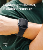 Apple Watch 12 42mm | Slim (2P) - A black smartwatch with a matte black band worn on a person's wrist, set against a dark green shirt. White text overlays read 'Lightweight Comfort, Reliable Protection' at the top and 'Weight 1.