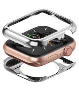 Apple Watch Series 6 / 5 / 4 / SE (44mm) | Full Frame - Exploded view of a rose gold Apple Watch with silver protective case.