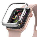 Apple Watch Series 6 / 5 / 4 / SE (40mm) | Bezel Styling - Silver protective bezel hovering above a pink Apple Watch.