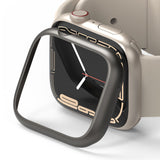 Apple Watch 9 / 8 / 7 (45mm) | Bezel Styling - A dark metallic bezel frame hovering above a beige Apple Watch.