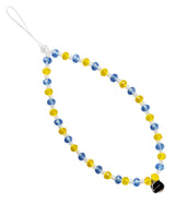 Beaded Strap - A loop of alternating blue and yellow faceted crystal beads with small white spacers and a black charm.